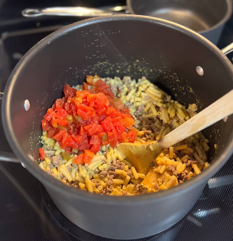 spicy macaroni and cheese in a stock pot