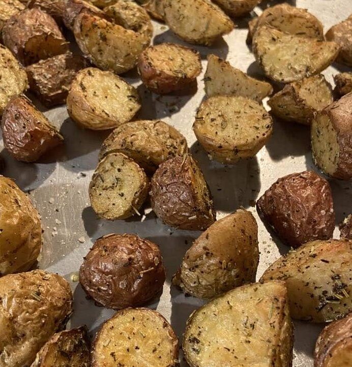 crispy roasted baby potatoes cooked on a sheet pan