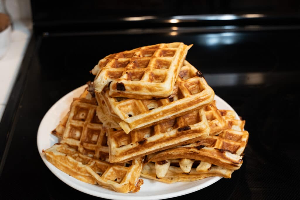 cottage cheese sourdough discard waffles setting on a plate