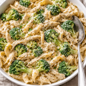 healthy cottage cheese chicken alfredo sitting in a baking dish