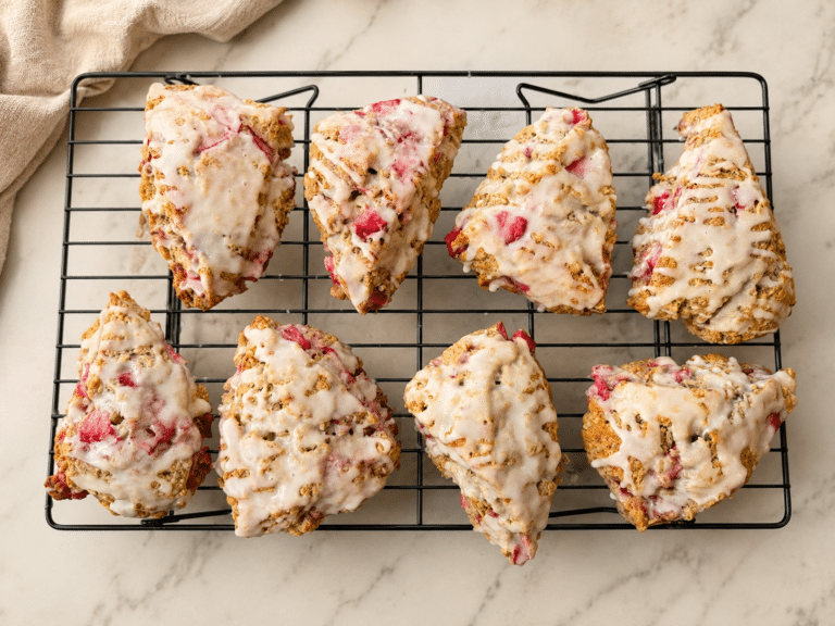 strawberry lemon sourdough scones sitting on a cooling rack